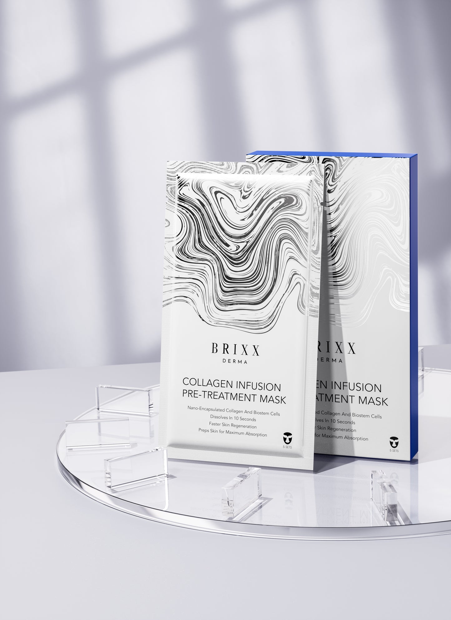 Brixx Derma collagen infusion pre-treatment mask packaging on a clear stand with a light background